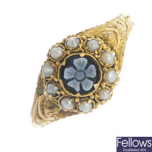 A mid Victorian 15ct gold hardstone and split pearl memorial ring.