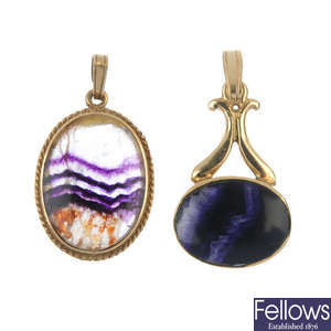 A selection of assorted gem-set pendants.