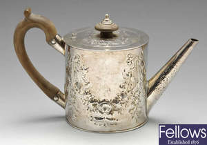 A late George III silver teapot. 