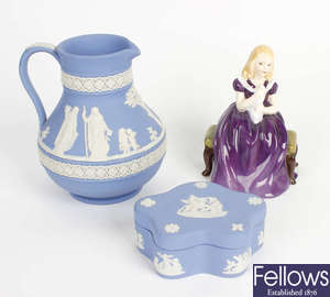A small Wedgwood jug and a pin tray, plus a Royal Doulton figure.  