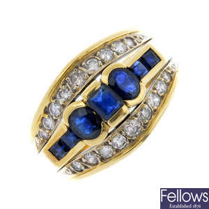 A gentleman's sapphire and diamond band ring.
