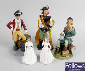 A group of five Royal Doulton figures. 