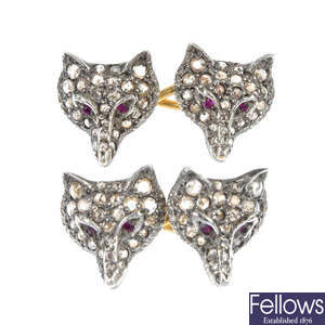 A pair of diamond and ruby fox cufflinks.