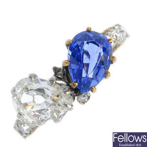 A sapphire and diamond two-stone dress ring.