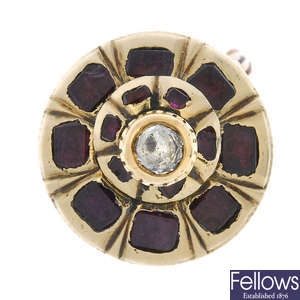 A late 19th century gold garnet and diamond cluster ring.