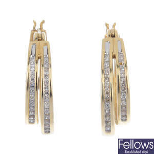 A pair of 9ct gold diamond ear hoops.