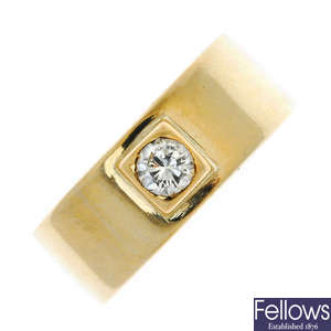 A 9ct gold diamond band ring.