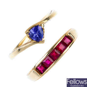 A selection of four 9ct gold gem-set rings and a pair of garnet ear studs.