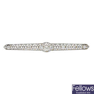 An early 20th century 18ct gold and platinum diamond bar brooch.