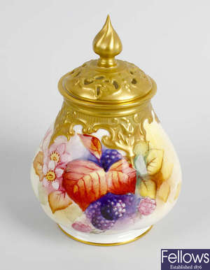 A Royal Worcester pot pouri and cover. 