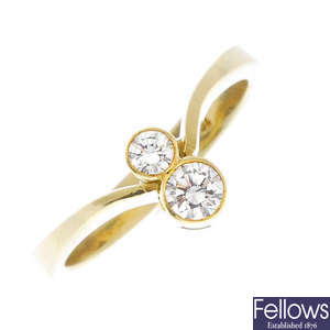 A diamond two-stone dress ring.