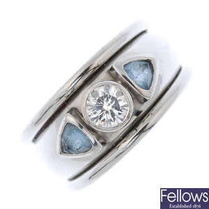An 18ct gold diamond and aquamarine ring.