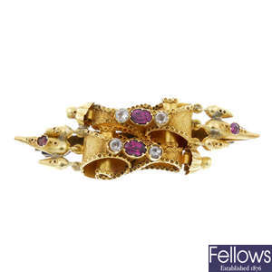  A late 19th century 18ct gold garnet and gem-set brooch. 