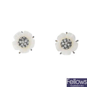 A pair of diamond and mother-of-pearl floral ear studs.