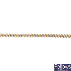 A 9ct gold diamond line bracelet.