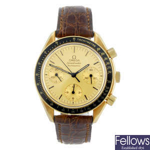 OMEGA - a gentleman's 18ct yellow gold Speedmaster chronograph wrist watch.
