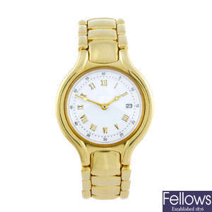 EBEL - a lady's yellow metal Beluga bracelet watch.