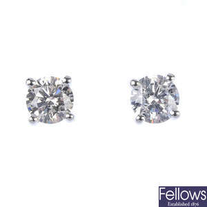 A pair of 18ct gold brilliant-cut diamond single-stone ear studs.