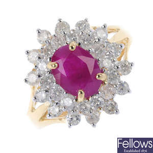 An 18ct gold ruby and diamond cluster ring. 