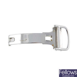 CARTIER - a white metal watch buckle, stamped 18k.