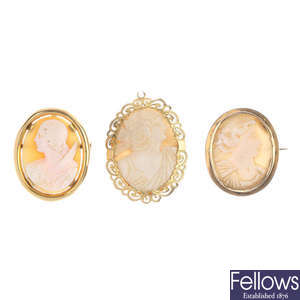 Three mounted shell cameo brooches. 