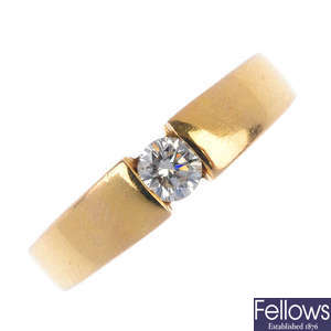 A gentleman's diamond single-stone ring.