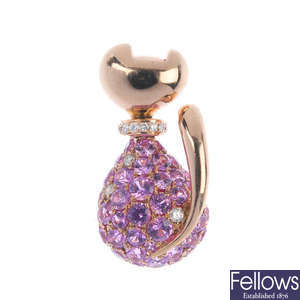 A sapphire and diamond stylised cat pendant.