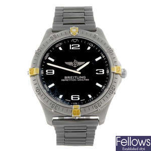 BREITLING - a gentleman's titanium Professional Aerospace bracelet watch.