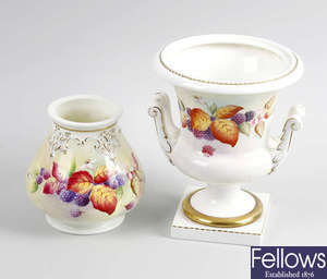 Two porcelain vases, by Florence Harvey, etc. 