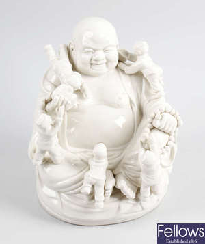 A Chinese Dehua blanc-de-chine figure of Hotei