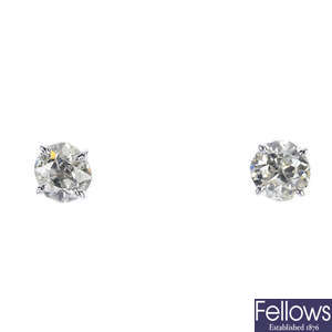 A pair of 18ct gold old-cut diamond ear studs. 