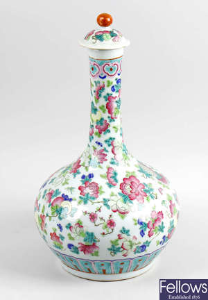 A 19th century Chinese famille rose vase and cover. 