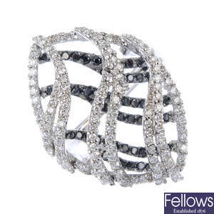 An 18ct gold diamond and gem-set dress ring.