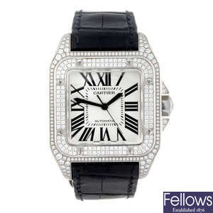 CARTIER - a factory diamond set 18ct white gold Santos 100 wrist watch.