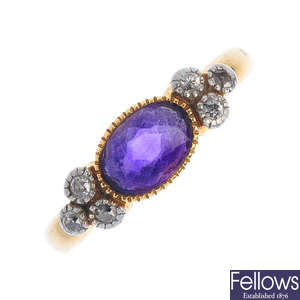 An 18ct gold purple stone and diamond ring and two pairs of earrings.