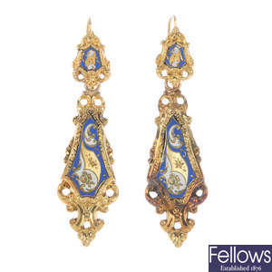 A pair of late 19th century enamel ear pendants.