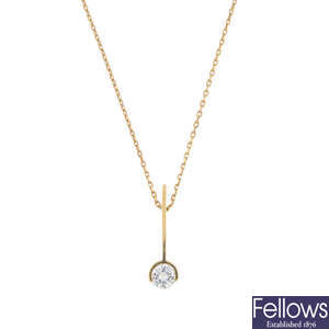 A 1970s 18ct gold diamond single-stone pendant.