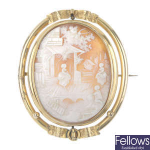 A late 19th century rolled gold swivel cameo brooch.