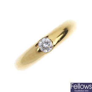 A diamond single stone ring.
