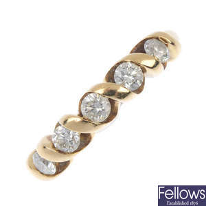 An 18ct gold diamond five-stone ring. 