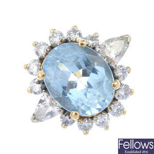 A aquamarine and diamond cluster ring.