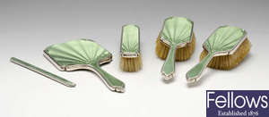 A 1930's silver and enamel part dressing table set.