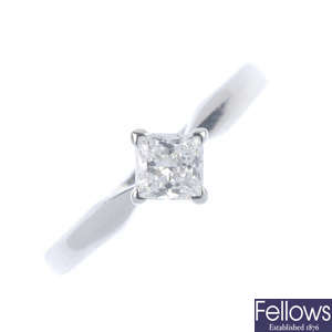 A platinum diamond single-stone ring. 