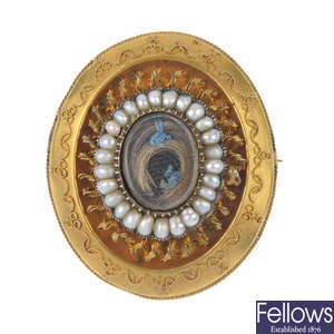 A mid Victorian gold pearl mourning brooch, circa 1860.