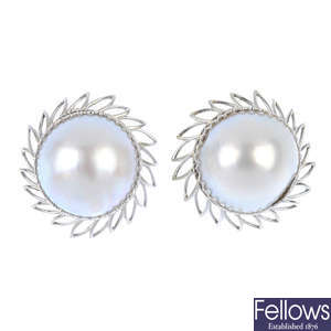 A pair of mabe pearl ear clips.