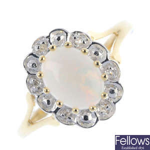 A 9ct gold opal and diamond cluster ring. 