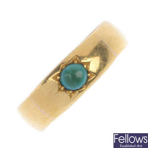 A late Victorian 22ct gold turquoise band ring.