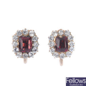 A pair of garnet and paste cluster ear clips.