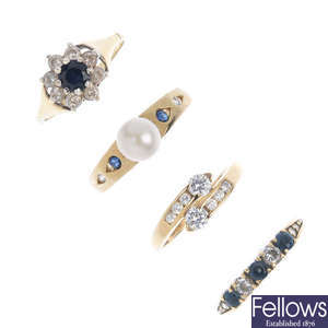 A selection of eight gem-set dress rings.