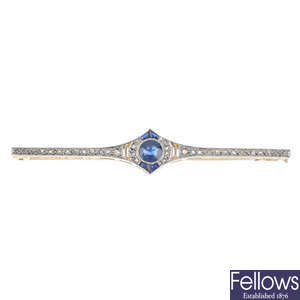 An early 20th platinum and 18ct gold sapphire and diamond brooch.